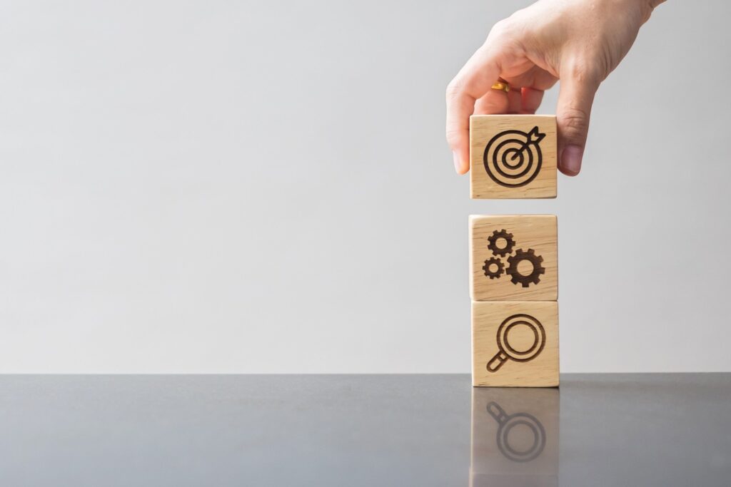 wood-block-with-business-goal-strategy-target